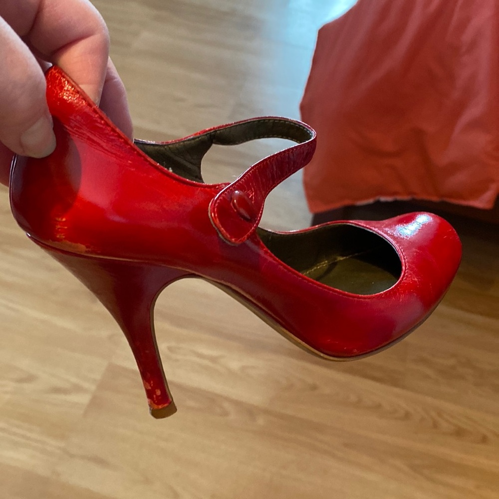 Paolo designer.   Size 4 red heels.